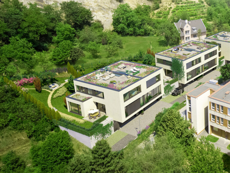 a building with trees and grass